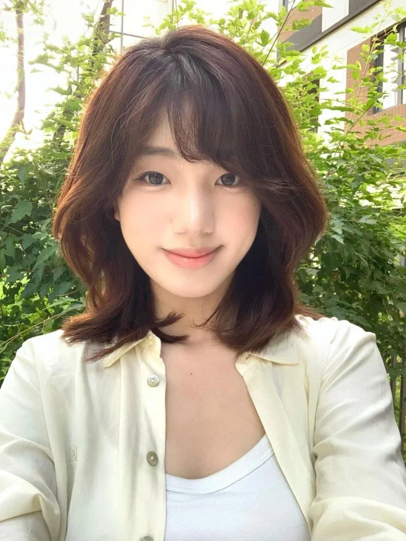 tóc xoăn lơi ngang vai (5)